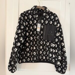 Converse women’s fleece full zip Black and White logo Patterned Jacket. $120 ret